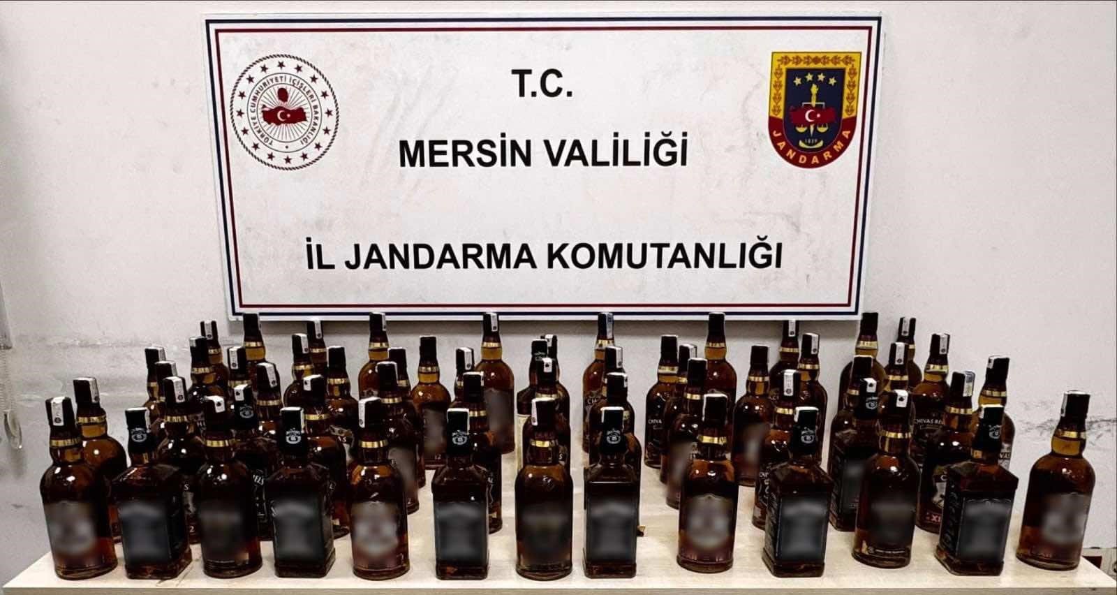 Otomobilden şişe şişe kaçak içki çıktı